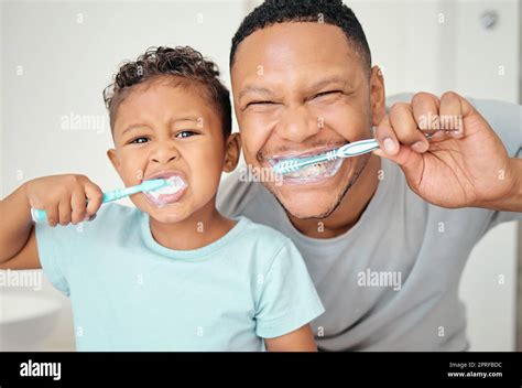 Daddy brushing teeth